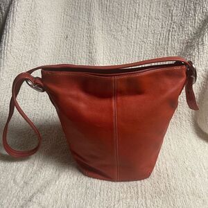Tignanello Leather Red bucket style shoulder bag/Crossbody bag.Brass hardwares